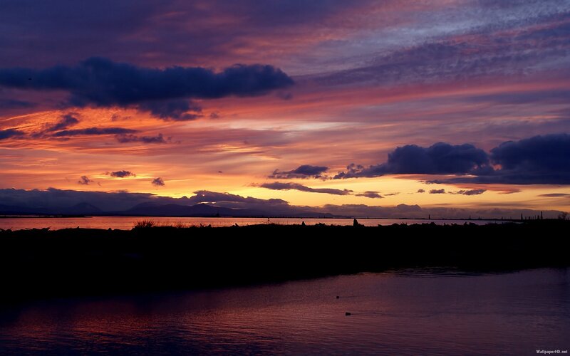 Sunset over Water — Purple, Dramatic, Photograph, Clouds, Mountains, Silhouette, Orange