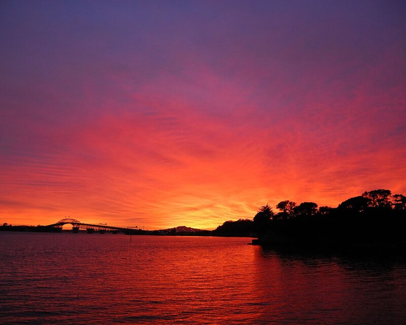 Sunset over Water — Red, Dramatic, Photograph, Bridge