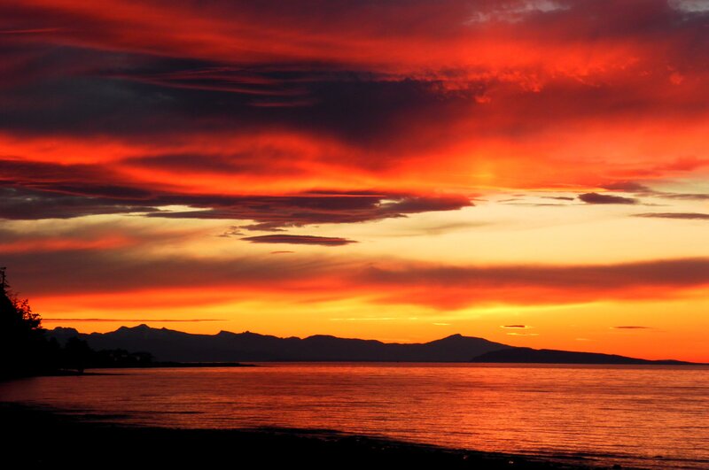 Sunset over Water — Red, Dramatic, Photograph, Mountains, Clouds