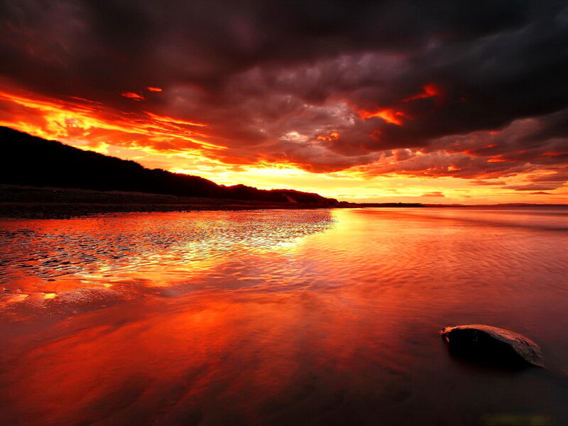 Sunset over Water — Red, Dramatic, Photograph, Sky, Rock