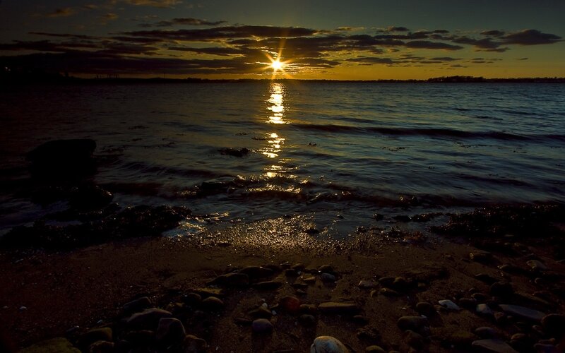 Sunset over Water — Yellow, Serene, Photograph, Sun, Clouds