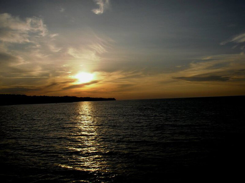 Sunset over Water — Yellow, Serene, Photograph, Sun