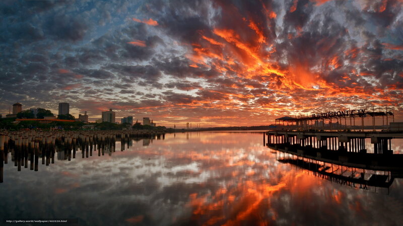 Sunset over waterfront city