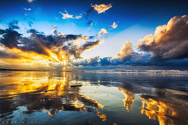 Sunset over Wet Beach — Blue, Dramatic, Photograph, Clouds