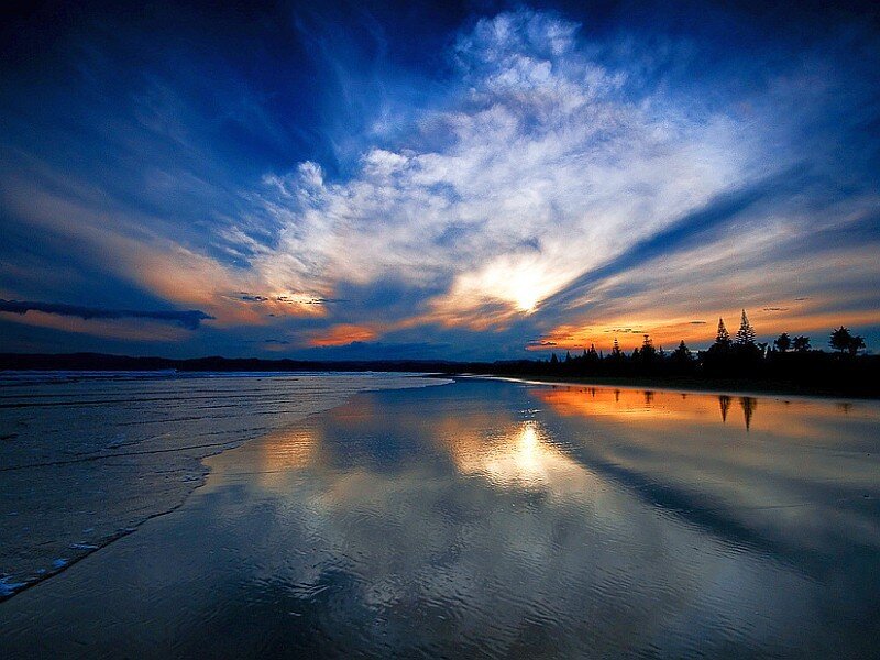 Sunset over Wet Beach — Blue, Dramatic, Photograph, Sky