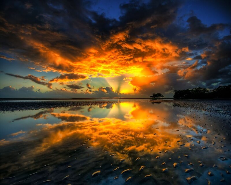 Sunset over Wet Beach — Dramatic