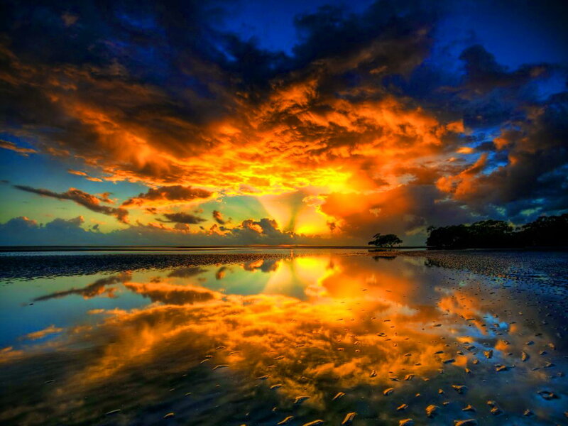 Sunset over Wet Beach — Orange, Dramatic, Photograph, Clouds