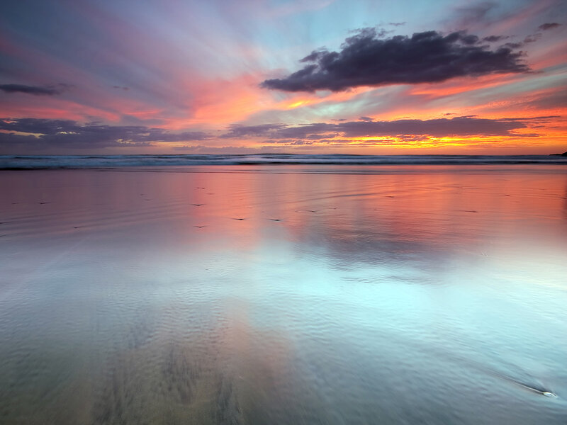 Sunset over Wet Beach — Orange, Serene, Photograph, Clouds