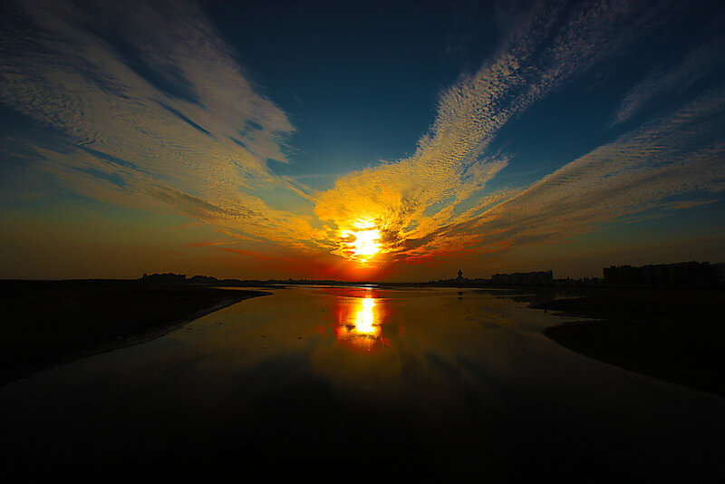 Sunset over Wet Sand — Orange, Dramatic