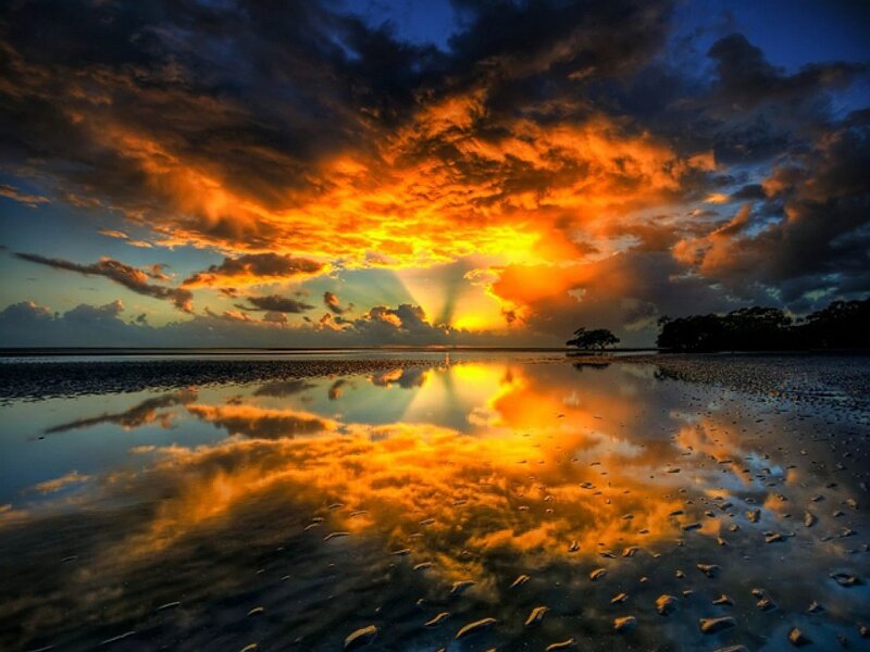 Sunset over Wet Sand — Orange
