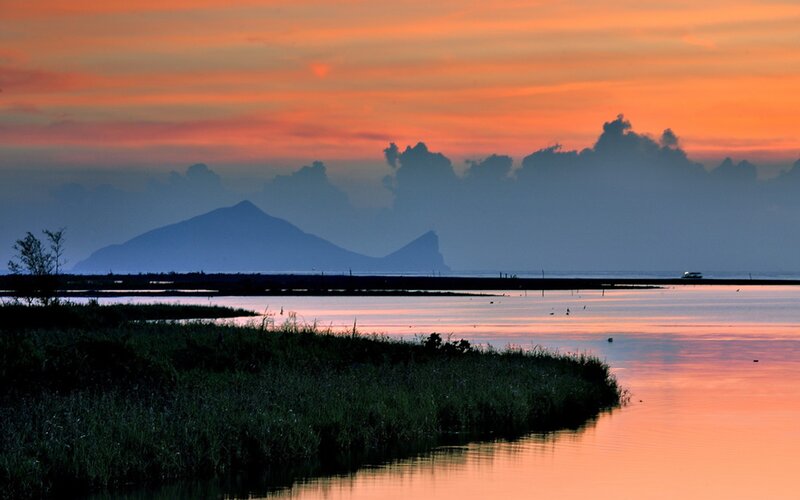 Sunset over Wetlands — Orange, Serene, Photograph, Mountains