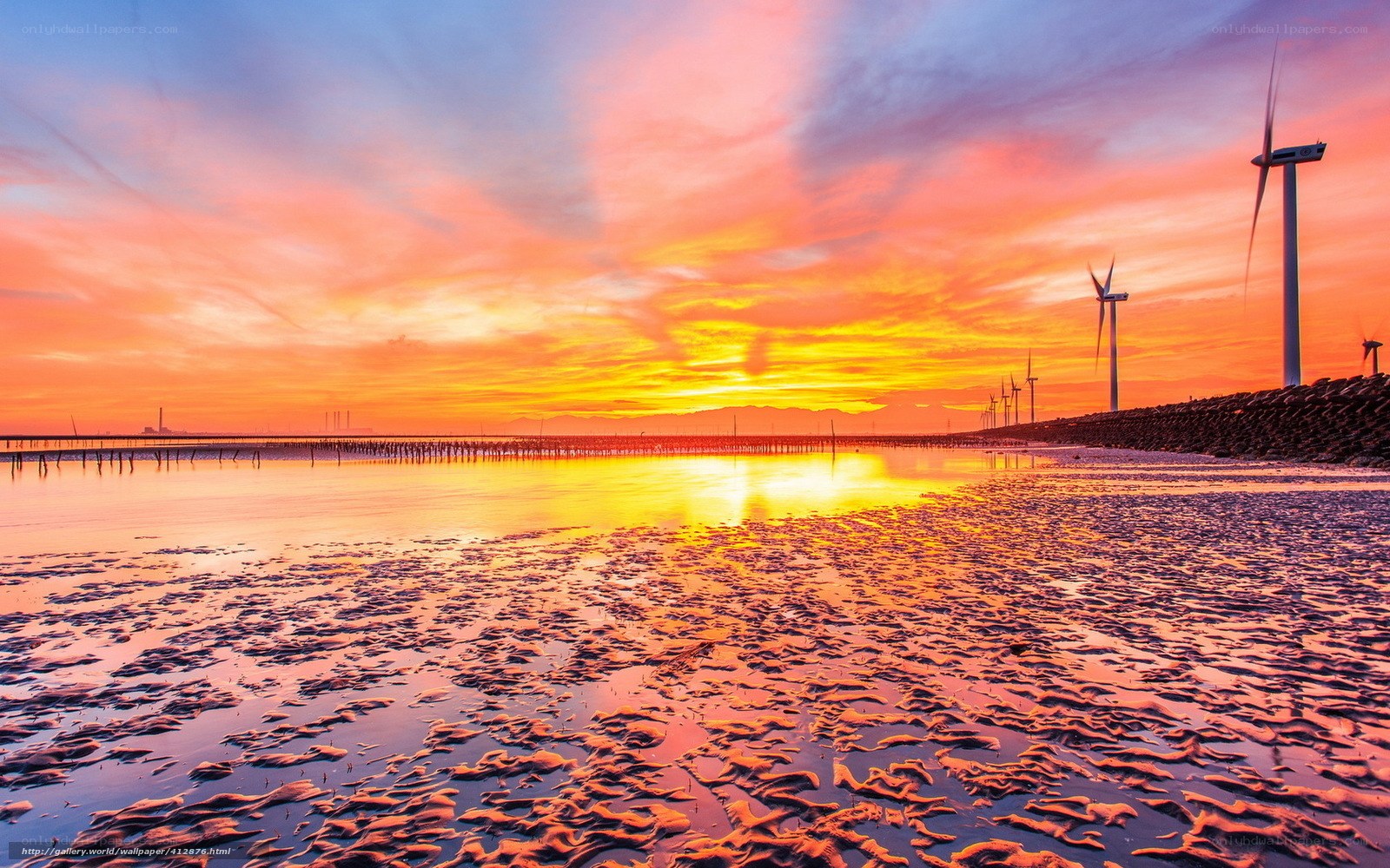 sunset over wind turbines