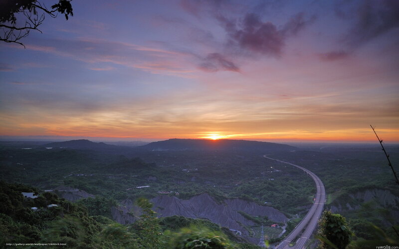 Sunset over winding highway