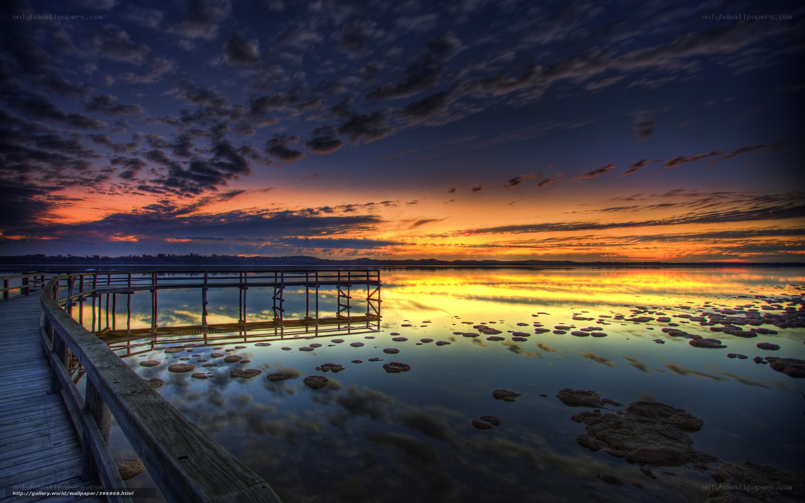 Sunset over wooden pier