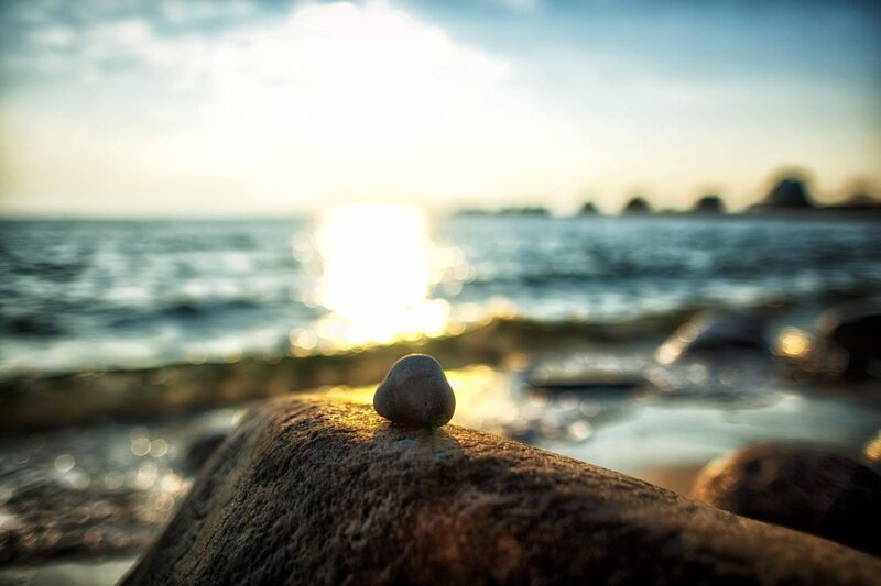 Sunset pebble on the shore
