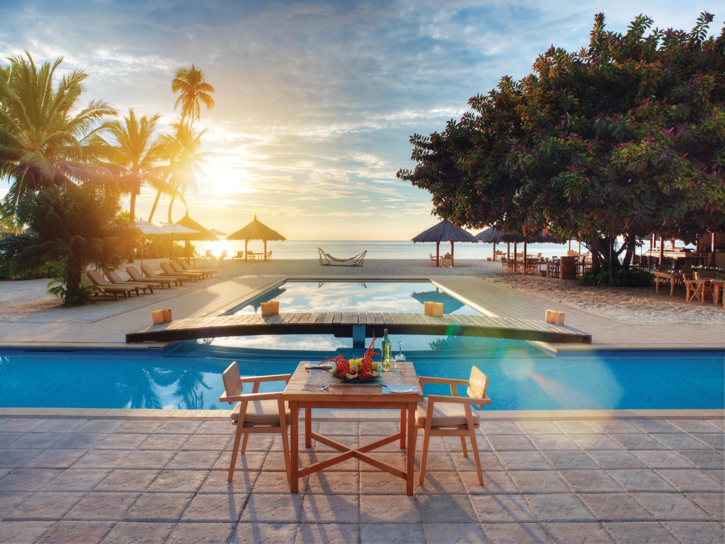 Sunset poolside dining