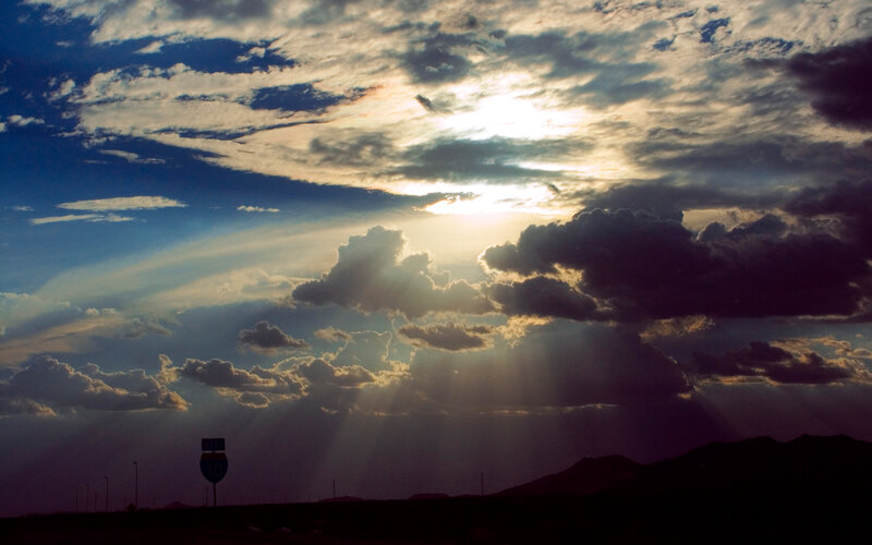 Sunset rays over highway
