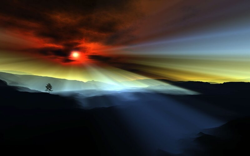 Sunset rays over mountains