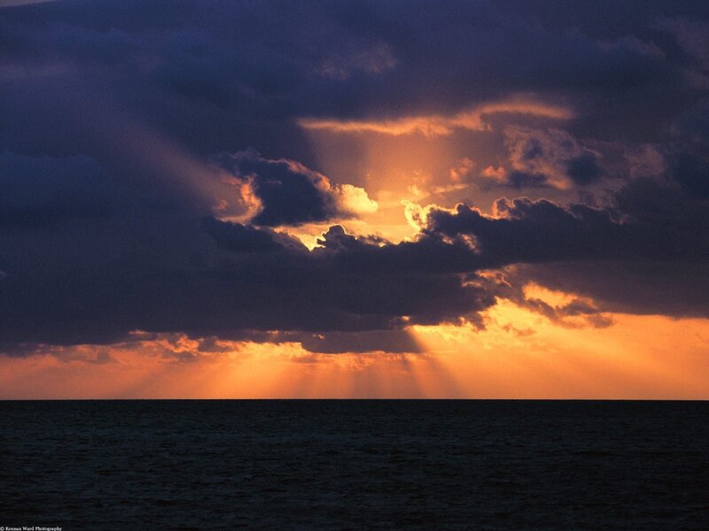 Sunset rays over the ocean