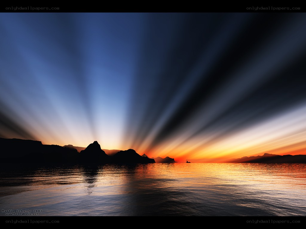 Sunset rays over water