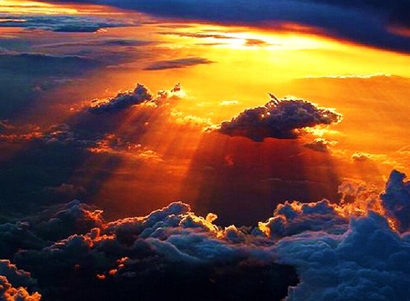 Sunset rays through clouds