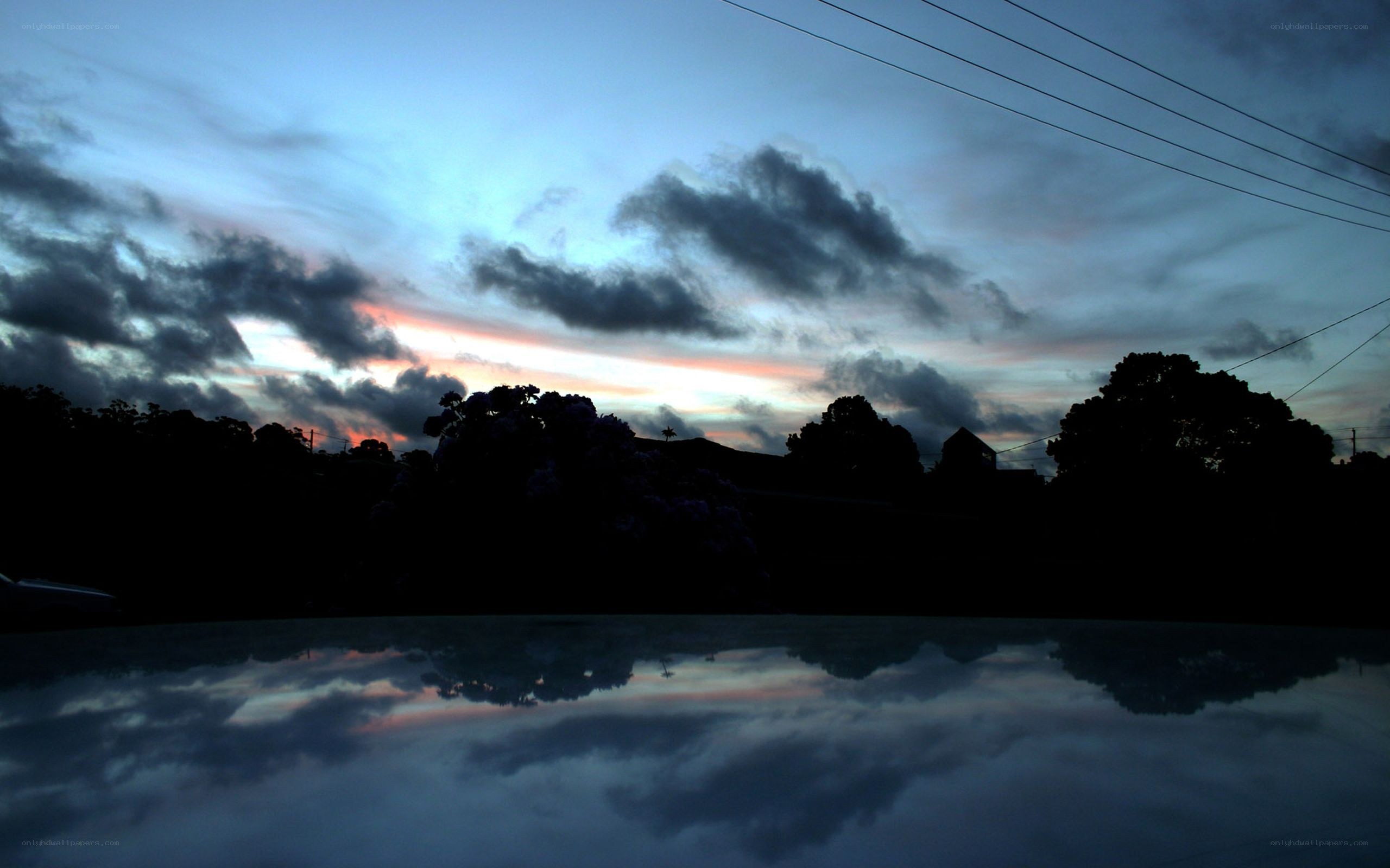 sunset reflected in car roof