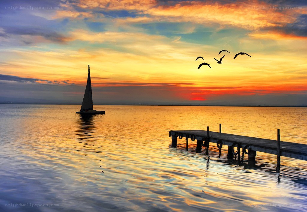 Sunset sailboat at the dock
