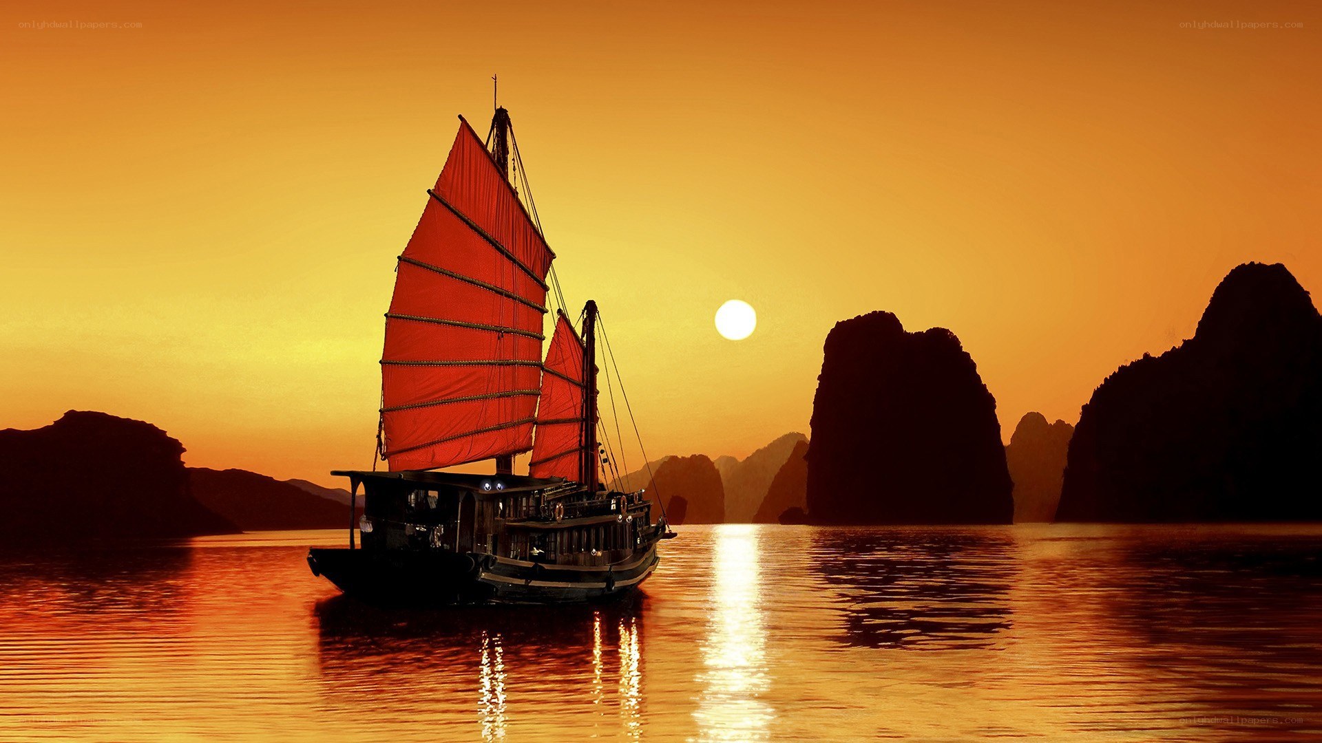 sunset sailboat in bay