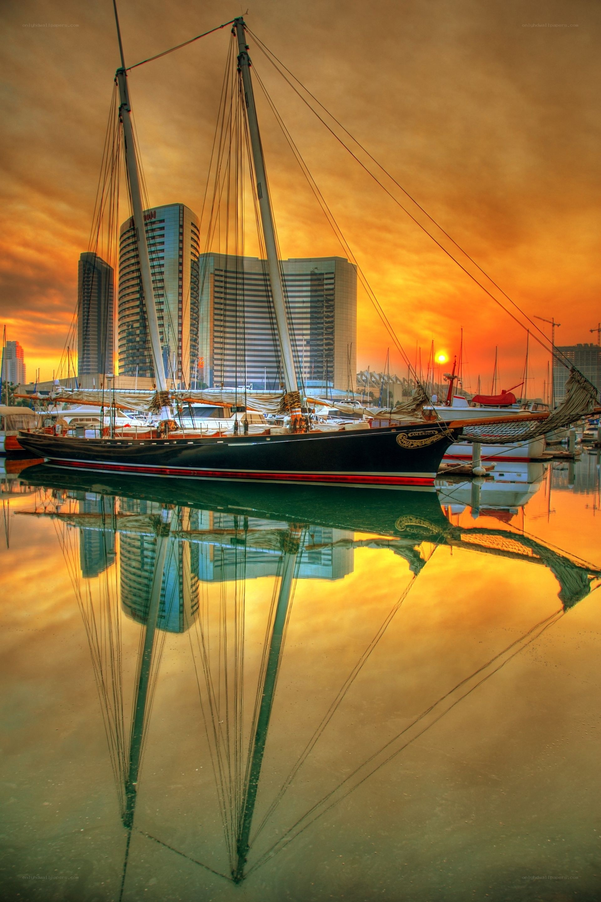 Sunset sailboat in harbor