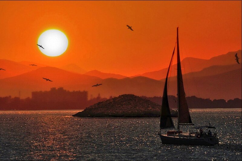 Sunset sailboat on the water