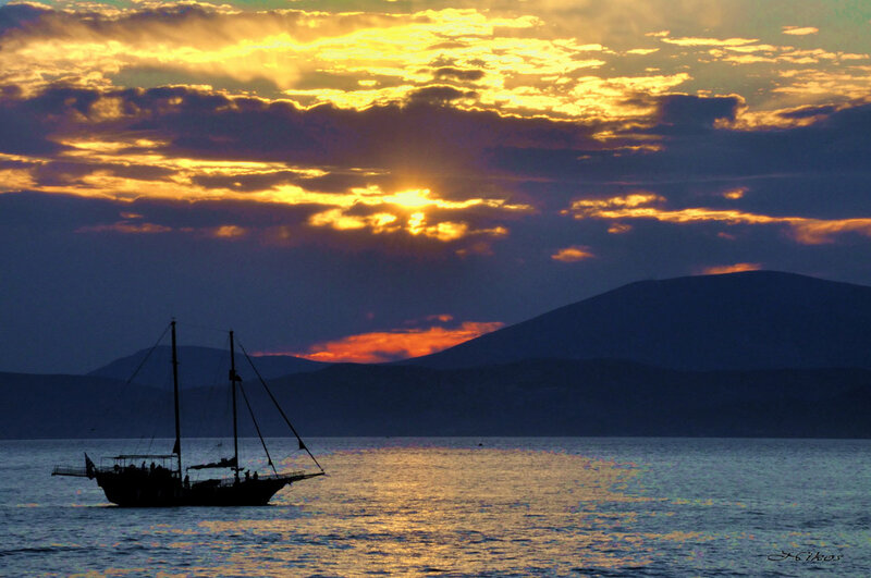 Sunset sailboat silhouette