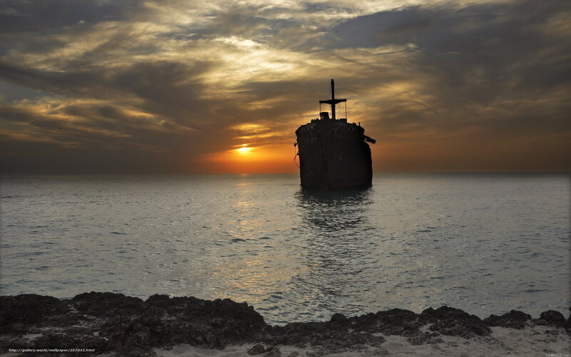 Sunset shipwreck silhouette