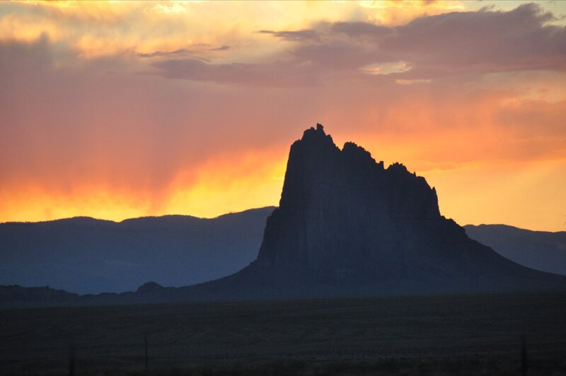 Sunset silhouette of a rock formation