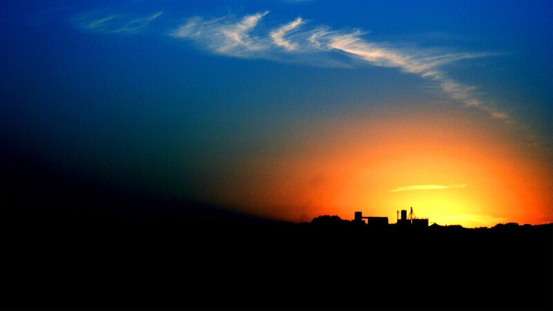 sunset silhouette of buildings