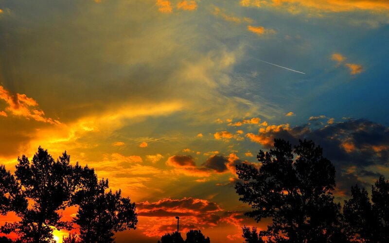 Sunset Sky with Clouds — Orange, Dramatic, Photograph, Trees, Airplane