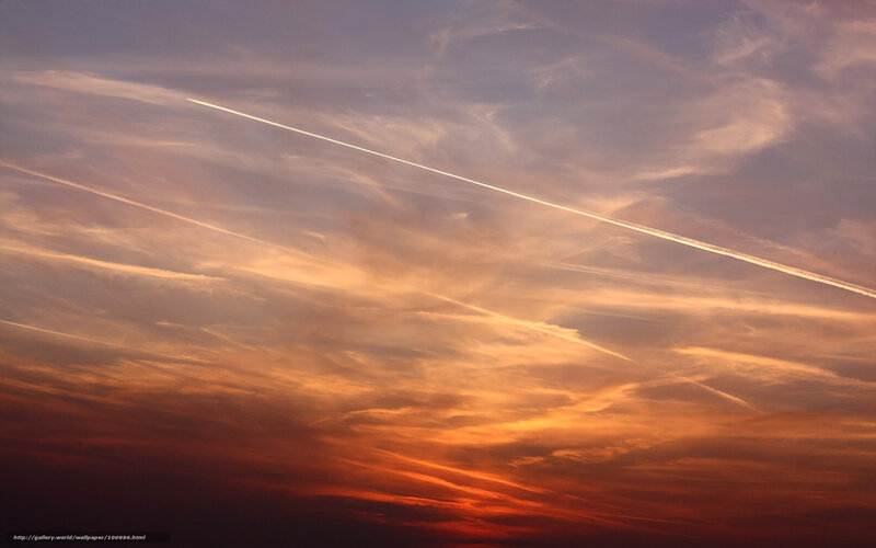 Sunset sky with contrails