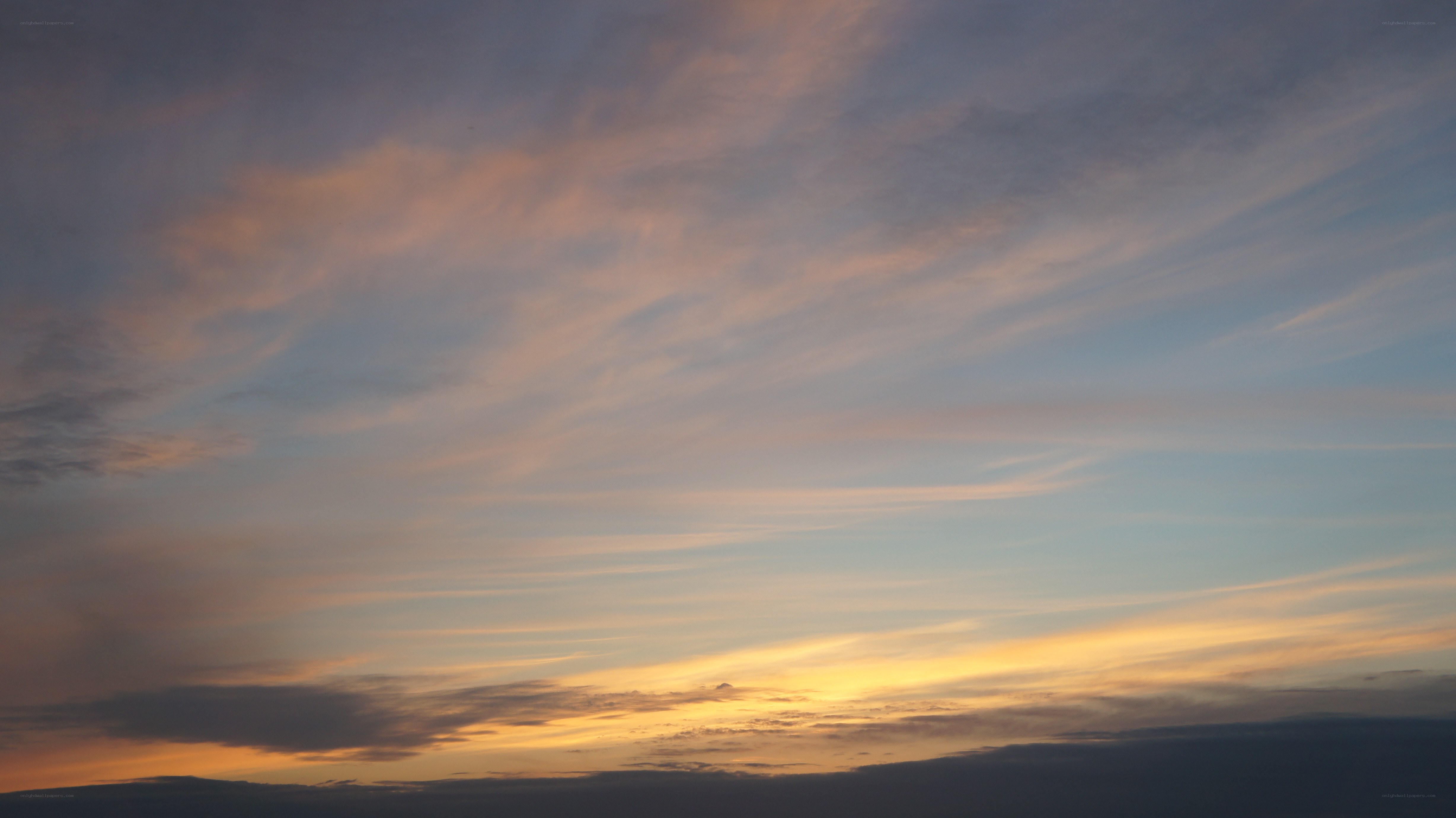 Sunset sky with wispy clouds
