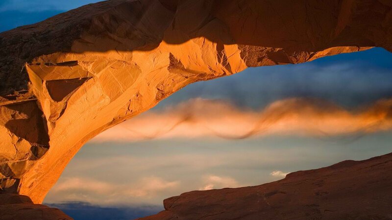 Sunset through a sandstone arch