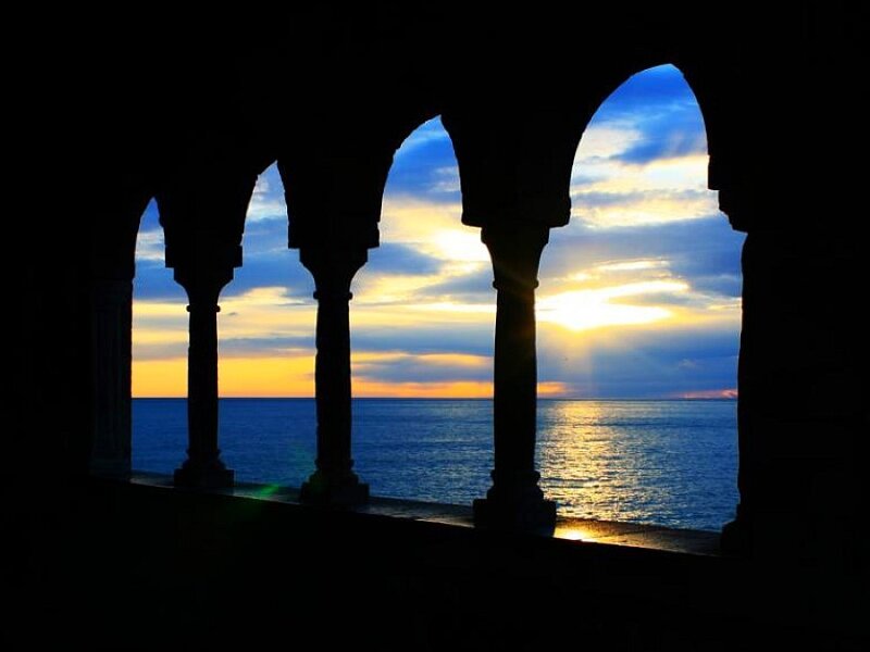 Sunset through arched columns