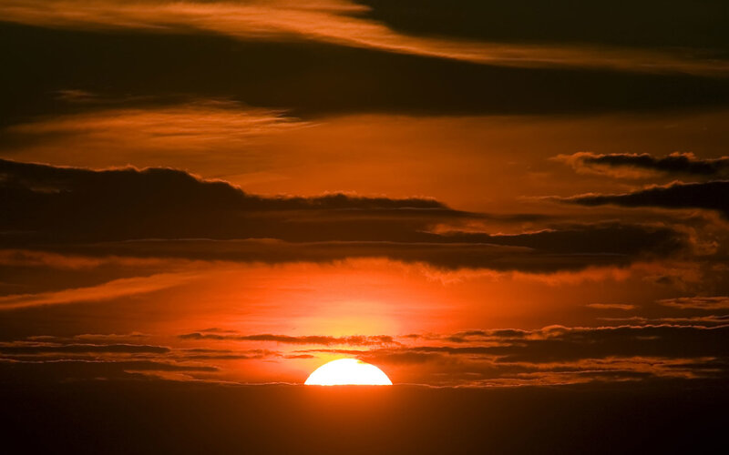 Sunset through clouds