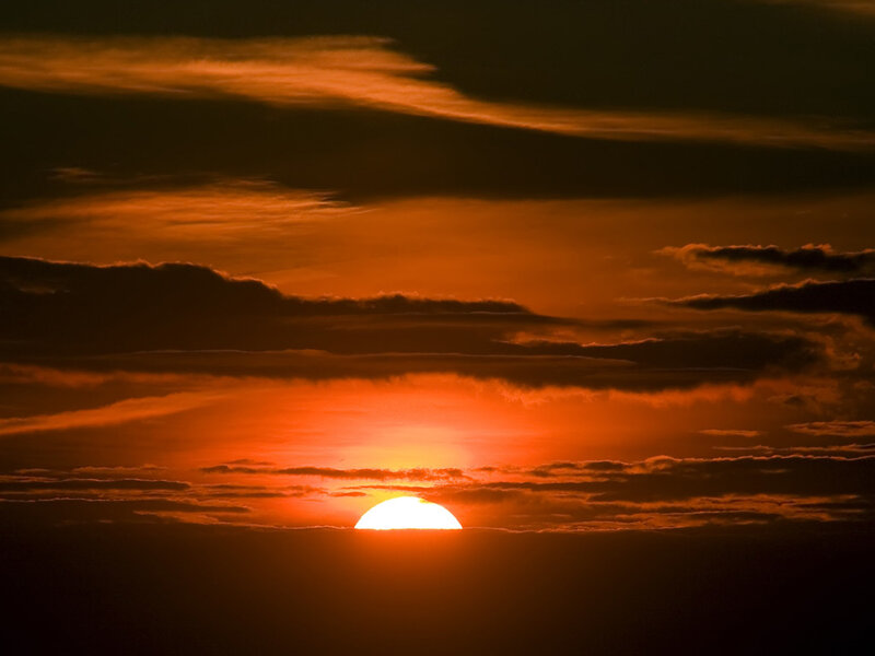 Sunset through clouds