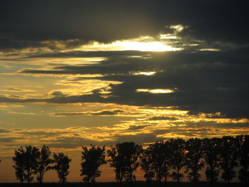 sunset through clouds