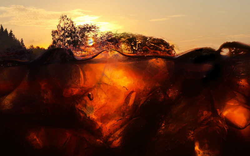 sunset through cola ice