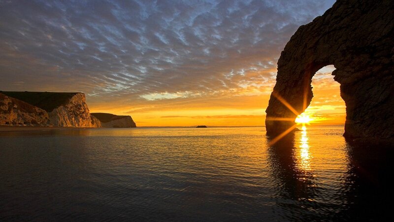 Sunset through Durdle Door
