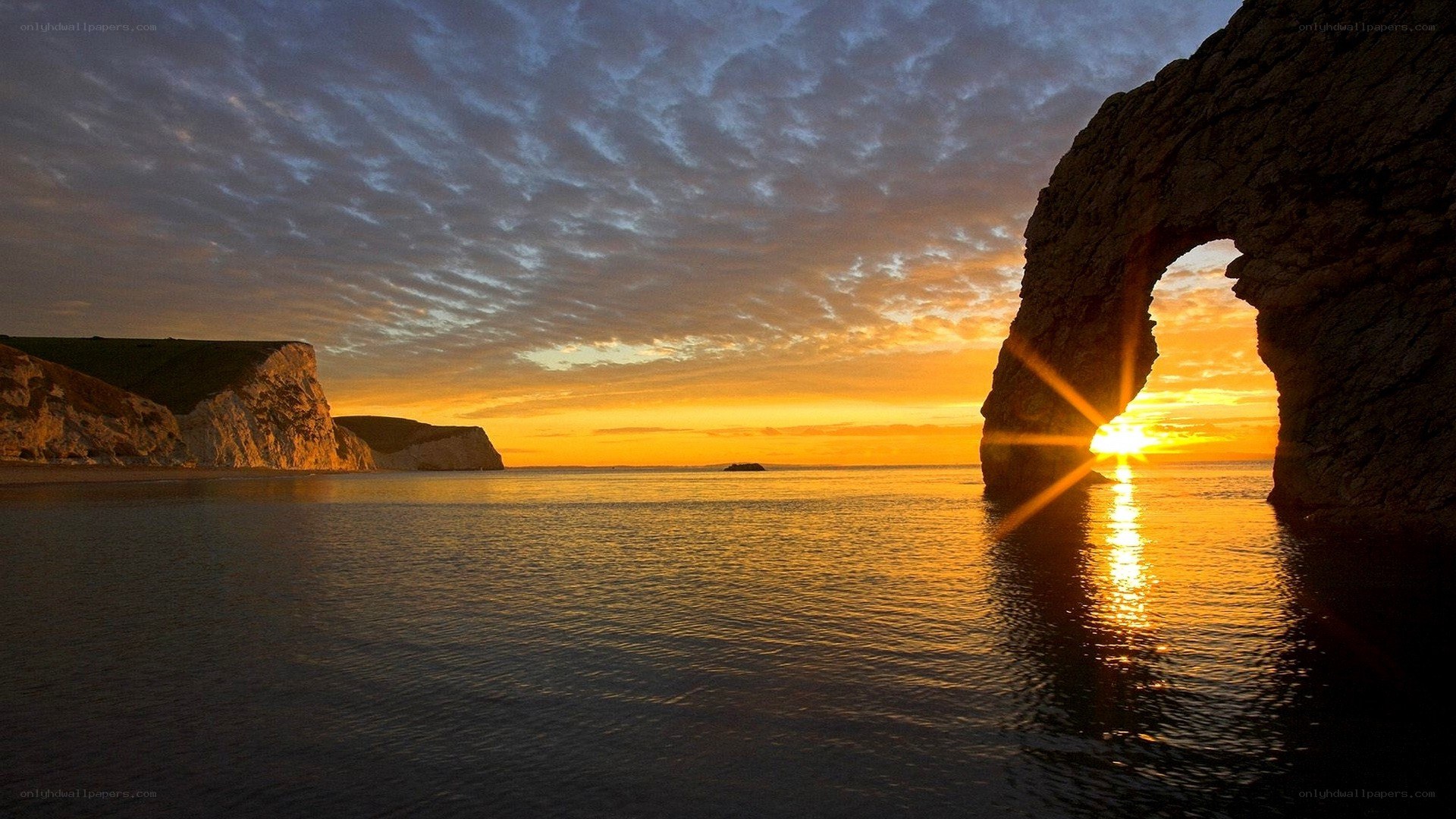 Sunset through Durdle Door
