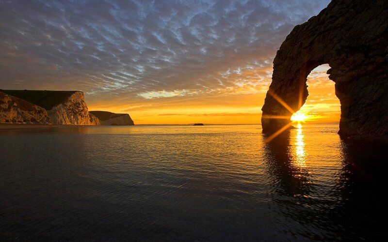 Sunset through Durdle Door