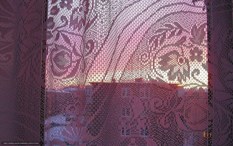 Sunset through lace curtain