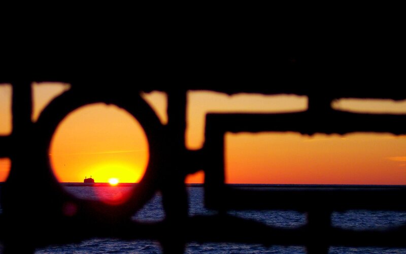 Sunset Through Railing