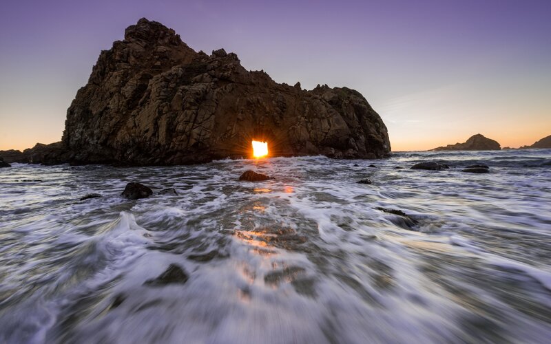 Sunset Through Rock Arch — Purple, Dramatic, Photograph