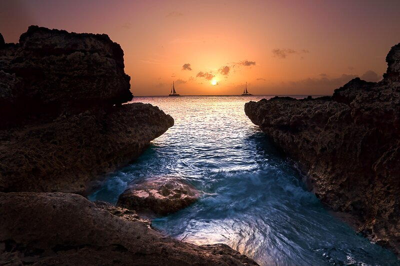sunset through rocky channel